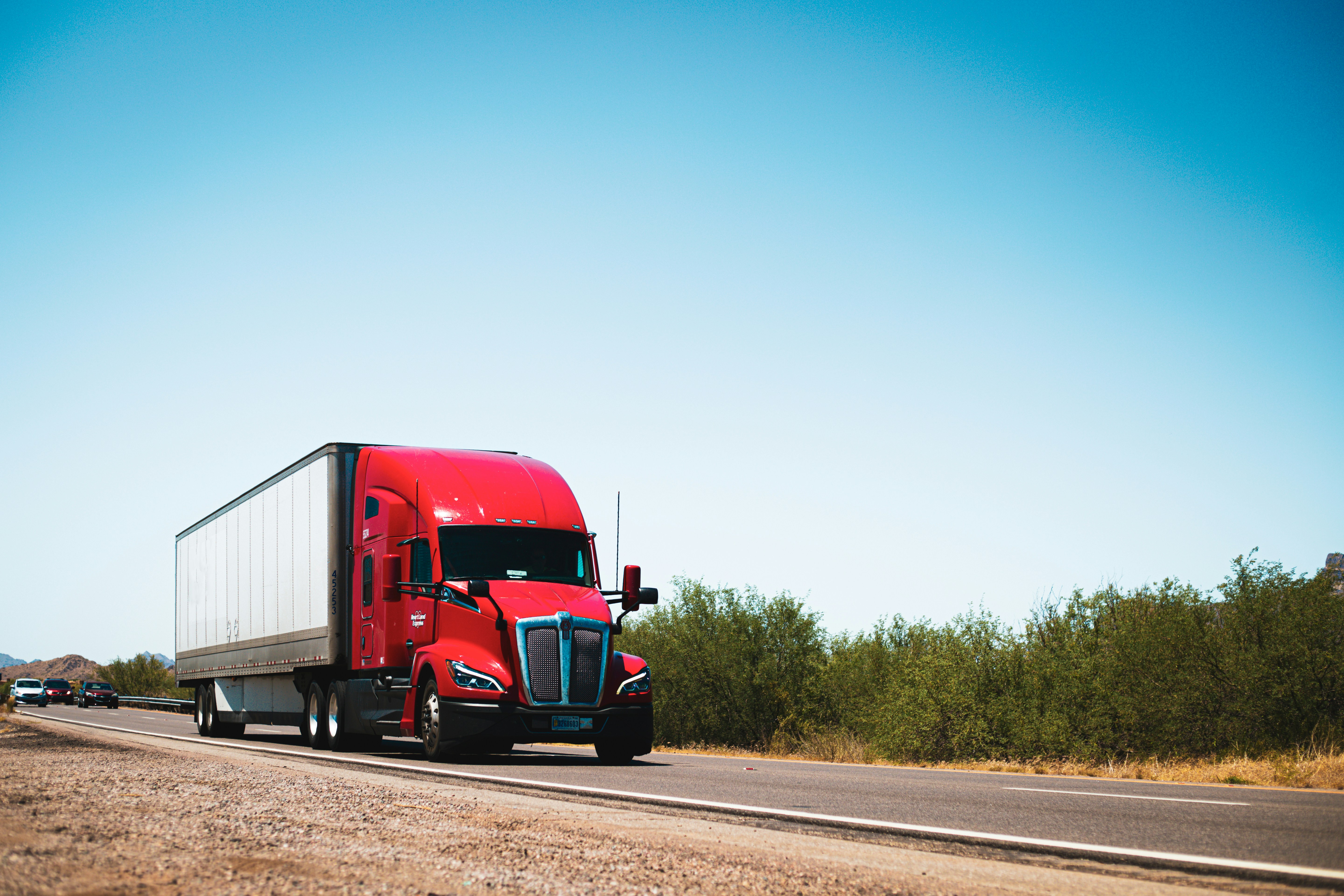 Freight truck on the road between facilities